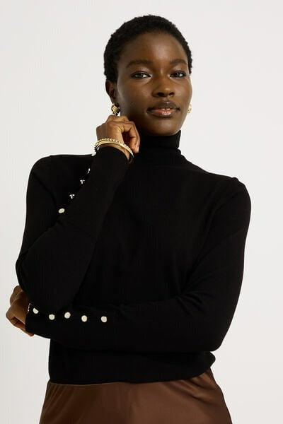 Pull col roulé femme